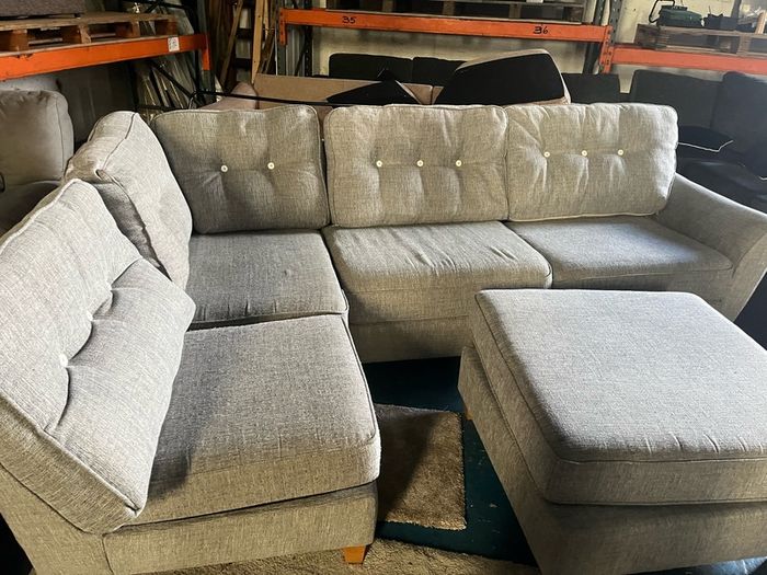 Grey corner sofa with matching footstool