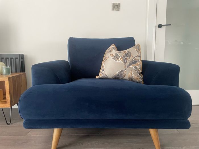 Navy velvet sofa and cuddle chair from Michael Murphy furniture