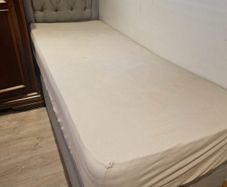 Small in width single bed. 1 year old. Teenagers room is being renovated. Bed with mattress and headboard.