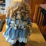 Leonardo Collectors porcelain doll, new in box. Image 2
