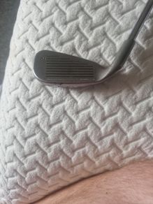 ping 2 iron high loft .