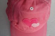 New pink sun cap tag attached