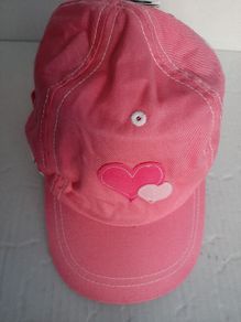 New pink sun cap tag attached