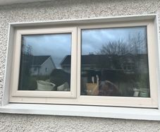 Treble glazed window