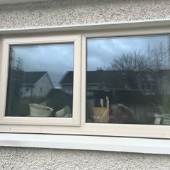 Treble glazed window