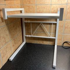 Extendable microwave shelf