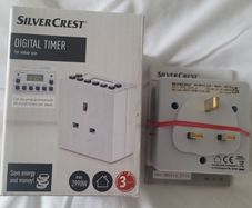 Two Silver Crest digital timer plugs