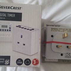 Two Silver Crest digital timer plugs