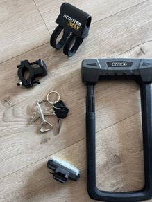 E-scooter lock, holder, light
