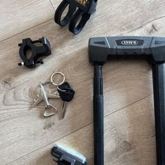 E-scooter lock, holder, light