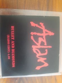 Aslan bullets and diamonds signed cd