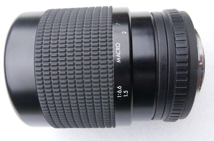 Pentacon Prakticar PB 4-5.6/55-200 MC is a vintage manual focus zoom lens made in East Germany