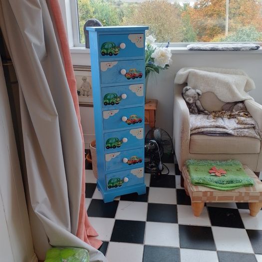 Blue children's chest of drawers with car motifs