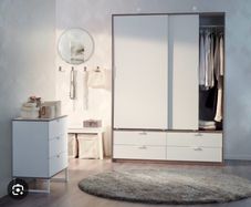 Sliding wardrobe with drawers