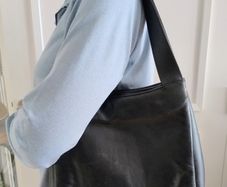 Genuine black leather handbag in excellent condition with no issues see last three photos for exact measurements FREE TRACKED POSTAGE INCLUDED