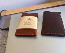Two Taurus Camp Mini Wallets, one used, one unused