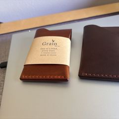 Two Taurus Camp Mini Wallets, one used, one unused