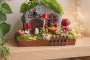 handcrafted fairy cottage with moss roof!