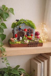 handcrafted fairy cottage with moss roof!