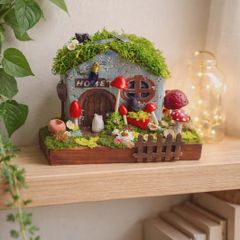 handcrafted fairy cottage with moss roof!