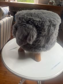 Grey faux fur footstool/seat