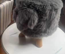 Grey faux fur footstool/seat