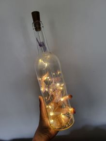 Decorative bottle with butterflies and light