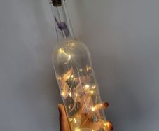 Decorative bottle with butterflies and light