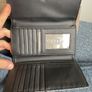 Guess purse. Never used but slightly worn due to storage. Image 4