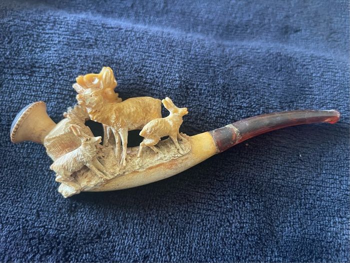 antique collection of clay  pipes
