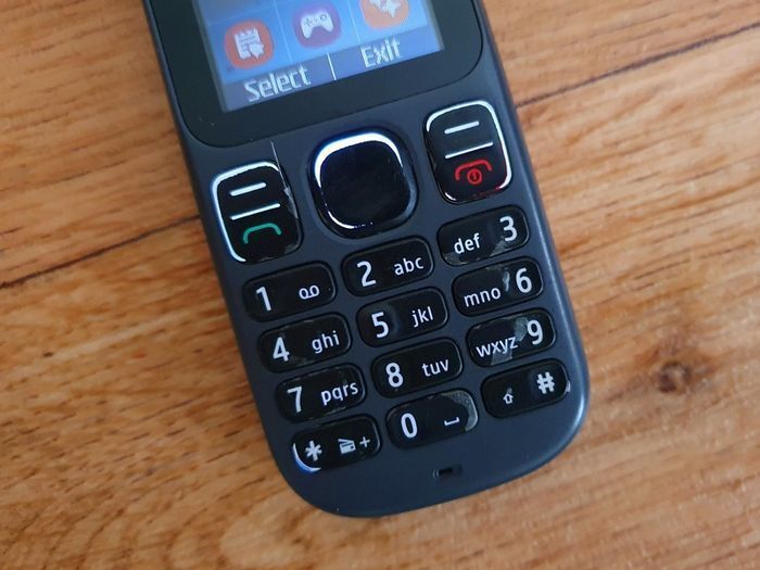 Nokia 100 - Boxed, Charger & Earphones - Excellent Condition