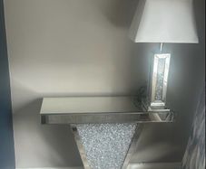 console table with lamp and clock