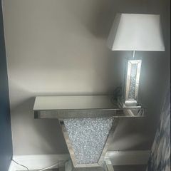 console table with lamp and clock