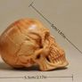 Carved wooden skull. Image 3