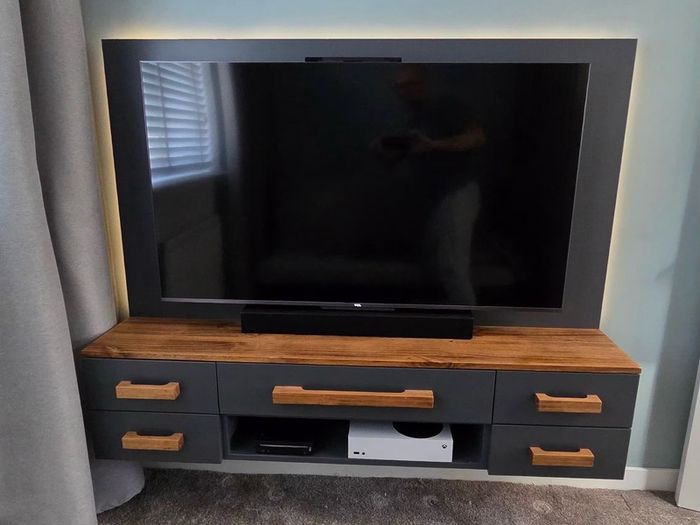 Bespoke wall hung TV console (TV and gaming gear not included)