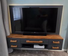 Bespoke wall hung TV console (TV and gaming gear not included)