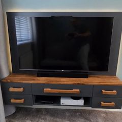 Bespoke wall hung TV console (TV and gaming gear not included)