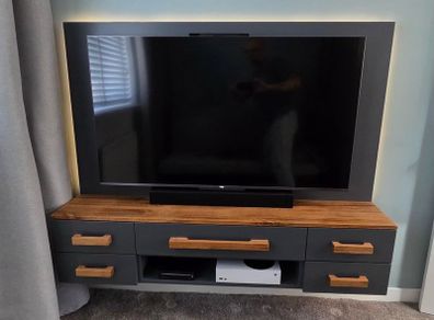 Bespoke wall hung TV console (TV and gaming gear not included)