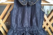 Girls black jumpsuit size 5 years from Next