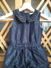 Girls black jumpsuit size 5 years from Next