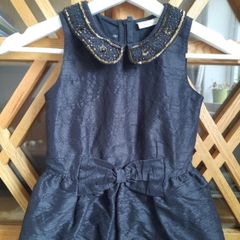 Girls black jumpsuit size 5 years from Next