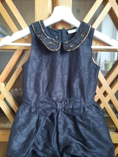 Girls black jumpsuit size 5 years from Next