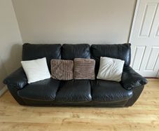 Black Leather Sofa with Recliner Back