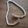 White beaded garland Image 3