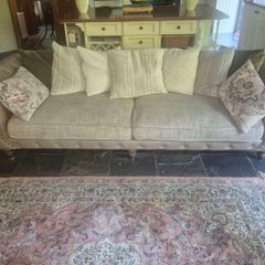 4 seater couch and 1 1/2 seater love couch...both Webb and Barker