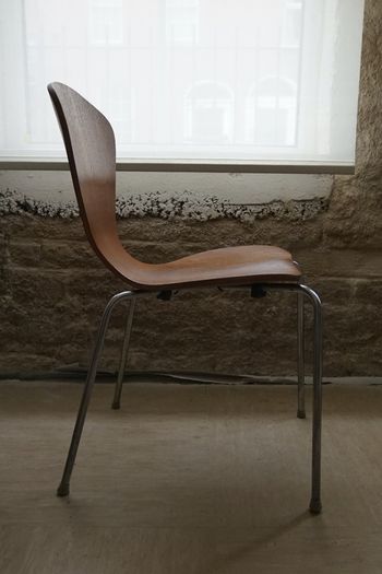 A pair of vintage Danish stackable dining chairs