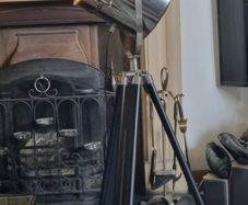 The Nautical is a large floor lamp with a tripod