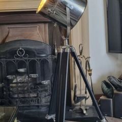 The Nautical is a large floor lamp with a tripod