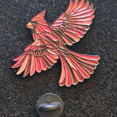 Flying bird , pin back badge.