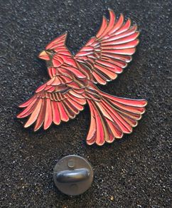 Flying bird , pin back badge.